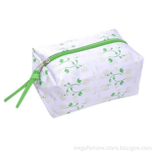Printed nylon tote bag with patent PVC handles/ribbon, magnetic closure and 190T lining
